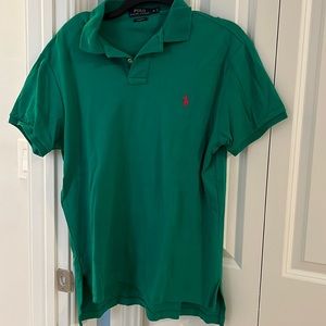 Green polo with pink pony